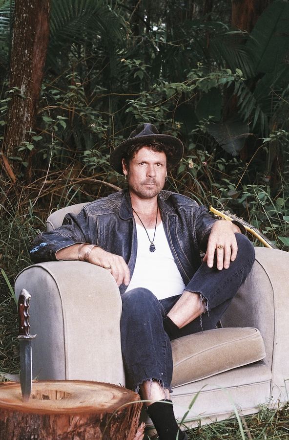 WaltSin promo photo — Couch — EPK Portrait